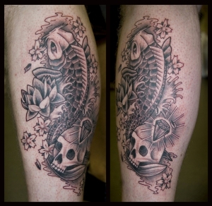 koi with skull calf tattoo